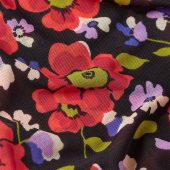 ilaria top baia king louie 10313 haut baia top en resillle manche longue extensible fond noir avec des grosses fleurs rouge - parme- vert