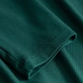Haut "stay forever rollneck" mademoiselle yeye 62203b sous pull avec col roulé vert